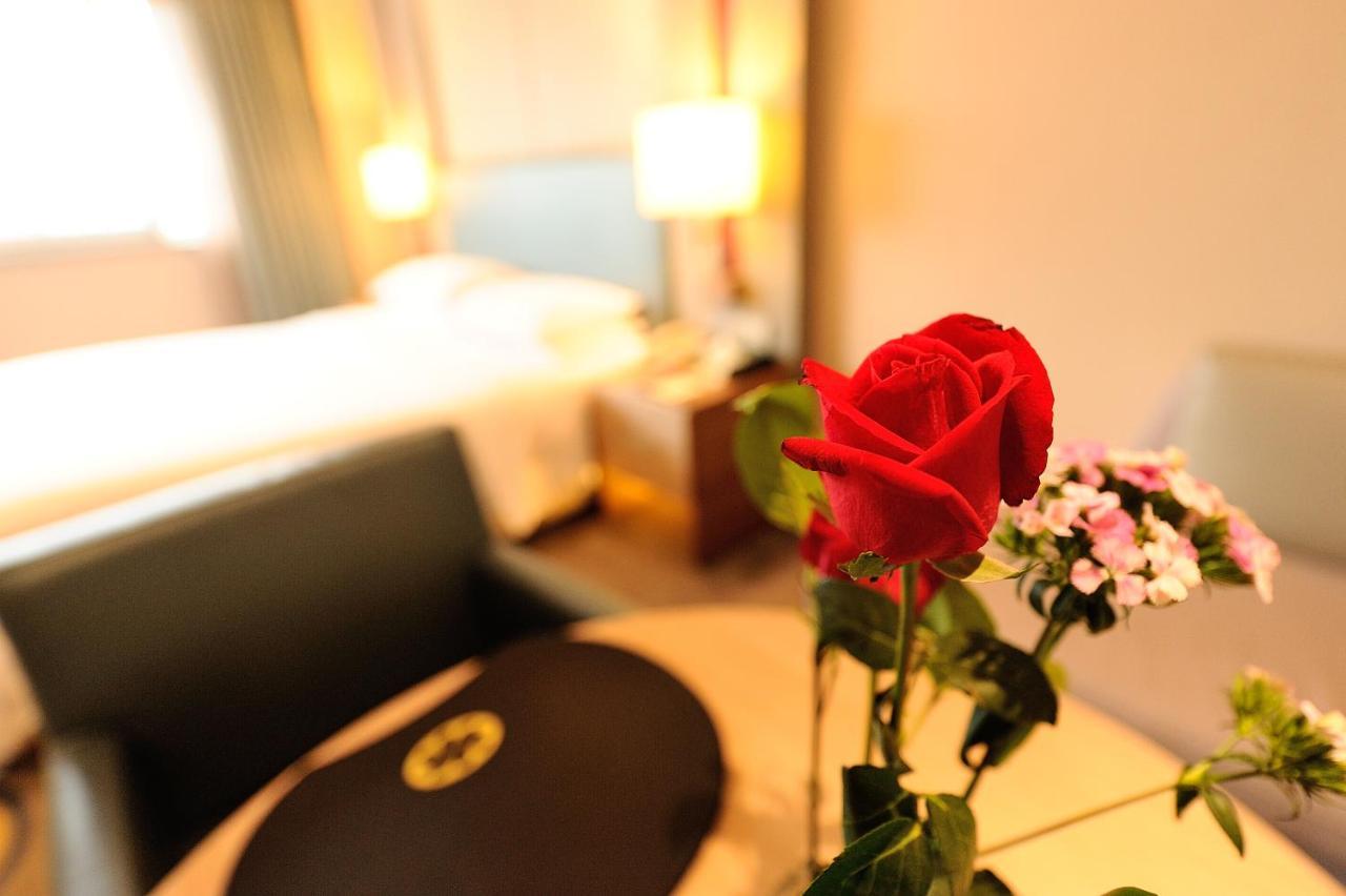 Inzone Garland Hotel Csinan Kültér fotó