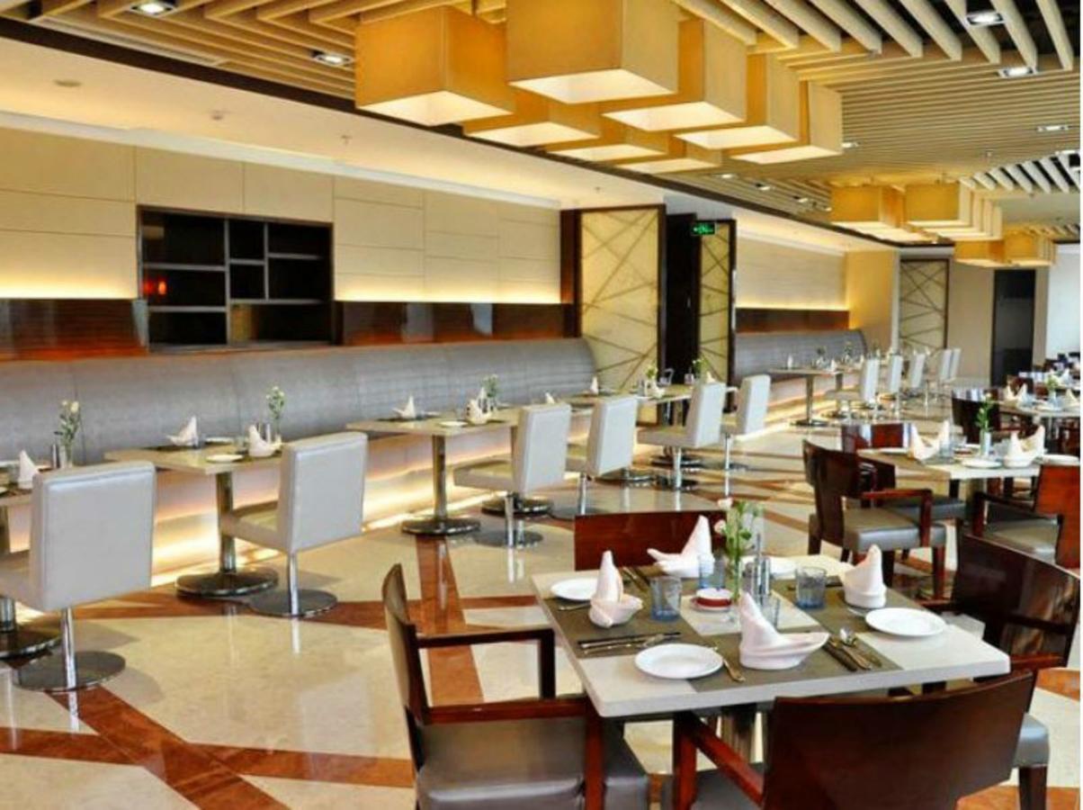 Inzone Garland Hotel Csinan Kültér fotó