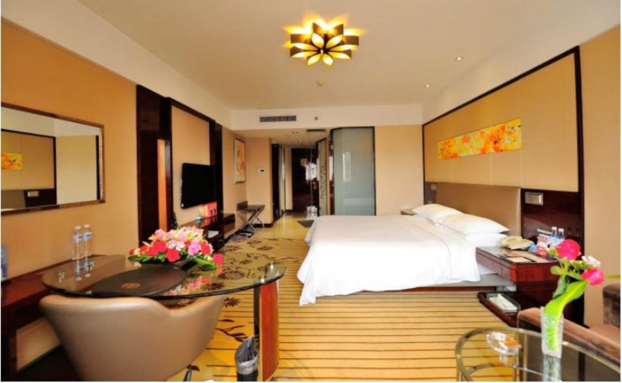 Inzone Garland Hotel Csinan Kültér fotó